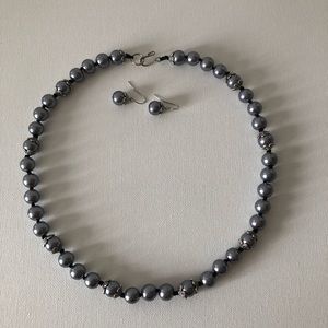 Black pearl necklace and earring set.